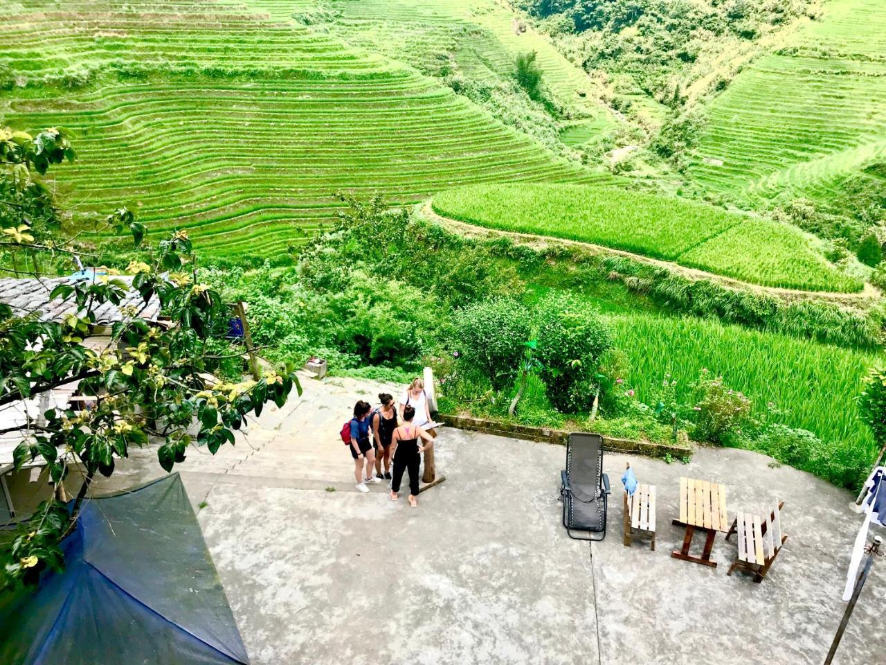 Dragon'S Den Hostel Луншэн Экстерьер фото