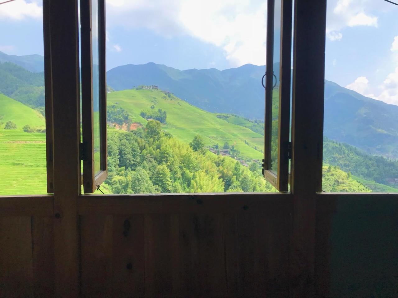 Dragon'S Den Hostel Луншэн Экстерьер фото