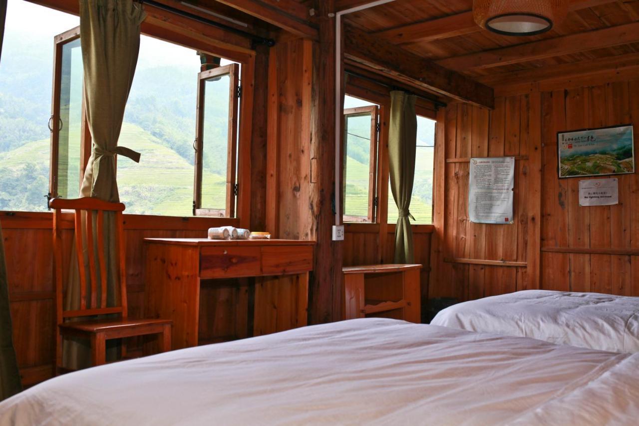 Dragon'S Den Hostel Луншэн Экстерьер фото