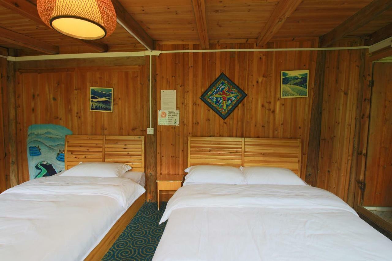 Dragon'S Den Hostel Луншэн Экстерьер фото